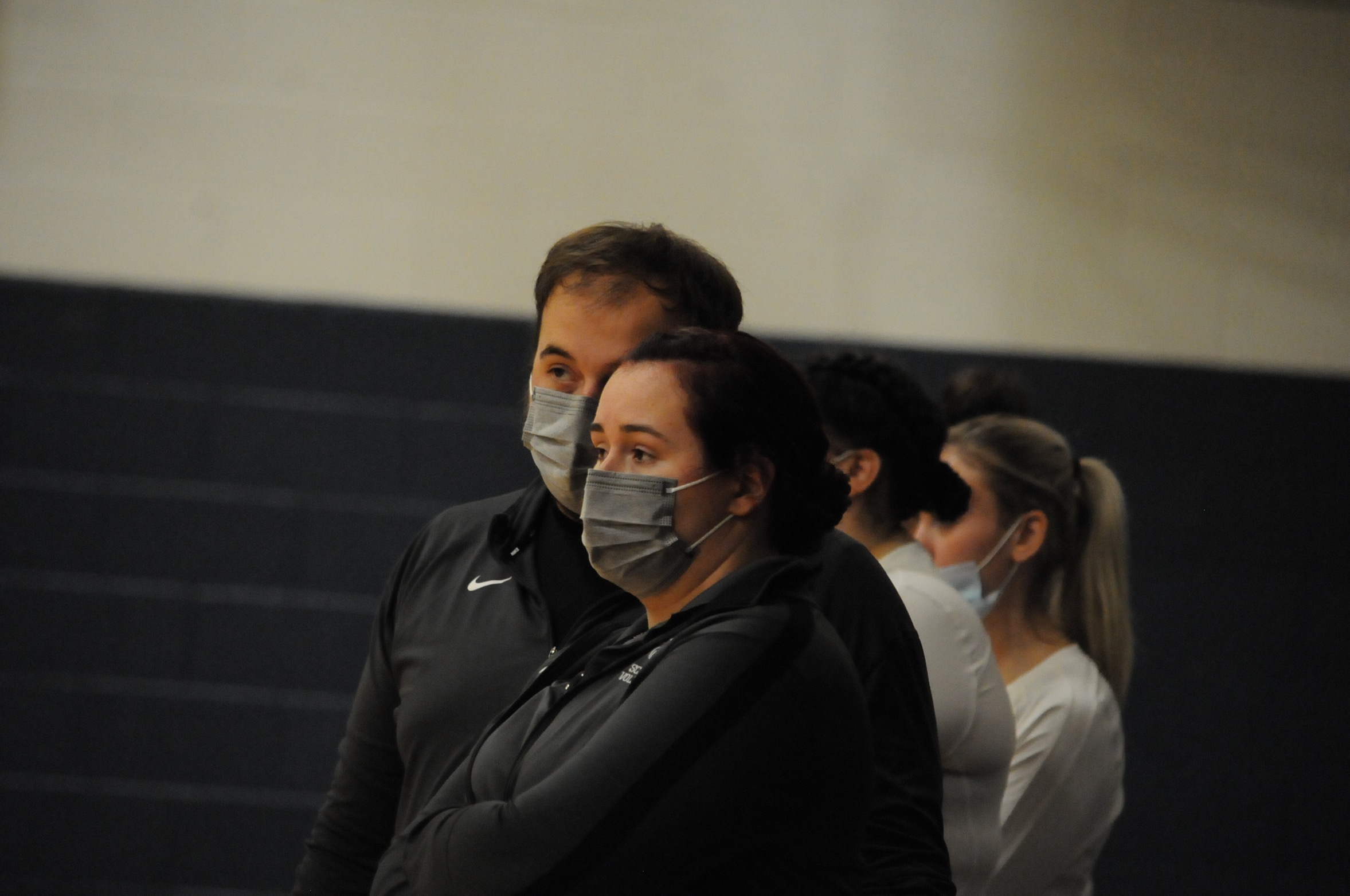 Mollie Demkosky (R) and her brother Jack coach on the sidelines during the 2021 season.